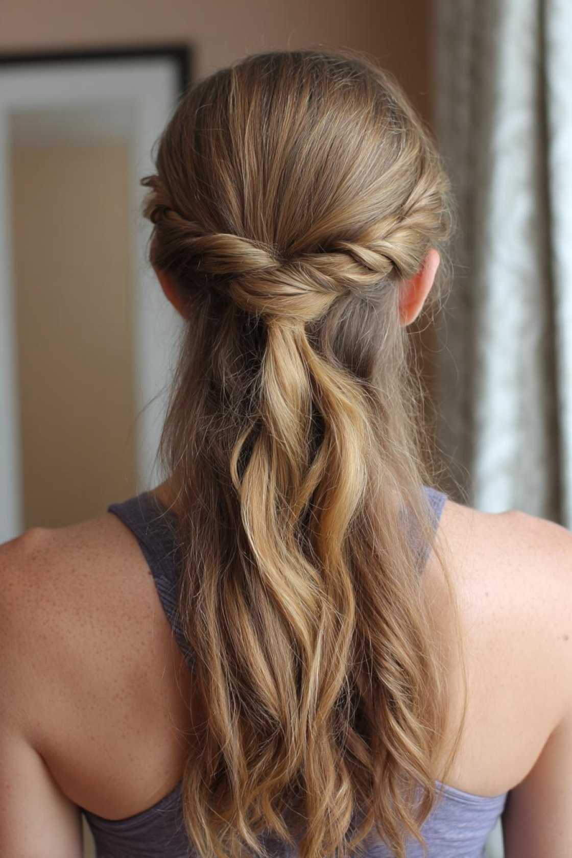15+ Gym Hair Ideas That Actually Stay Put (From HIIT to Yoga) - 14. The Twisted Half-Up