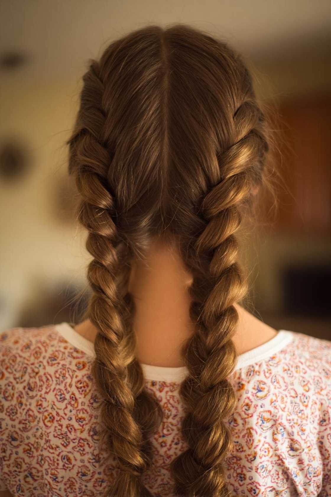 15+ Gym Hair Ideas That Actually Stay Put (From HIIT to Yoga) - 10. Pigtail Braids