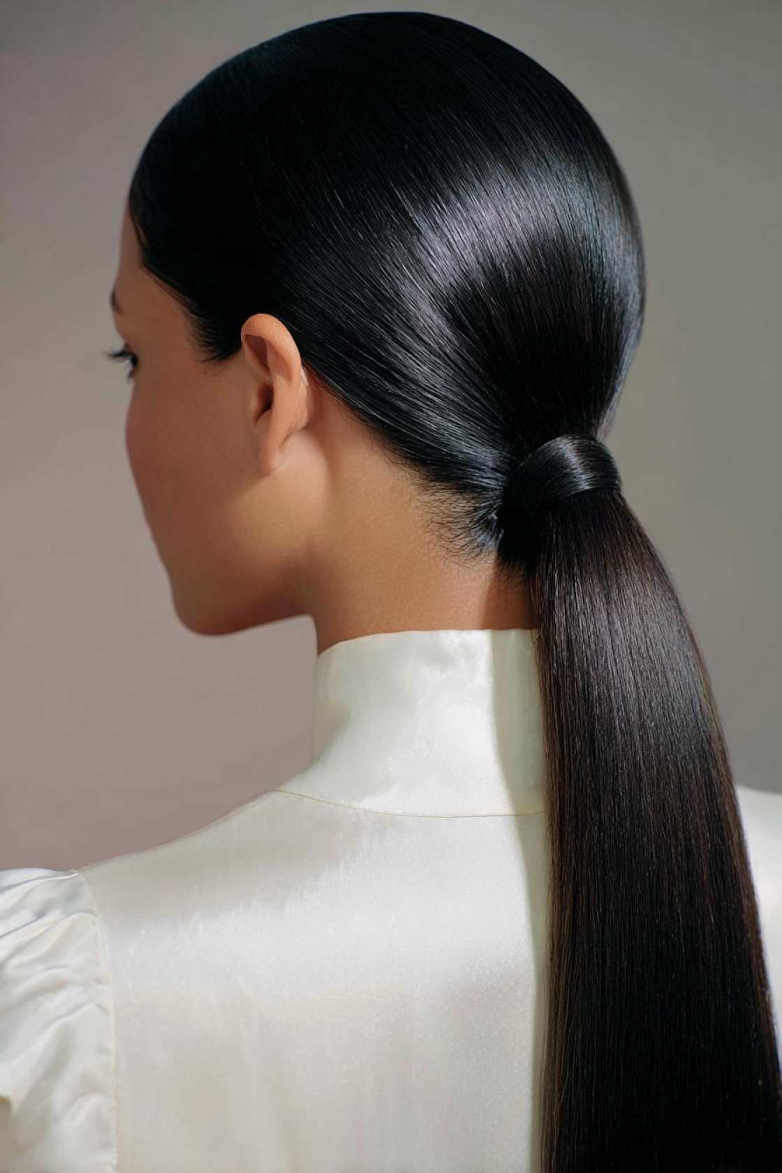 19+ Cute Ways to Wear Your Hair Up (Top Knots & Face-Framing Looks!) - 3. Sleek Low Ponytail