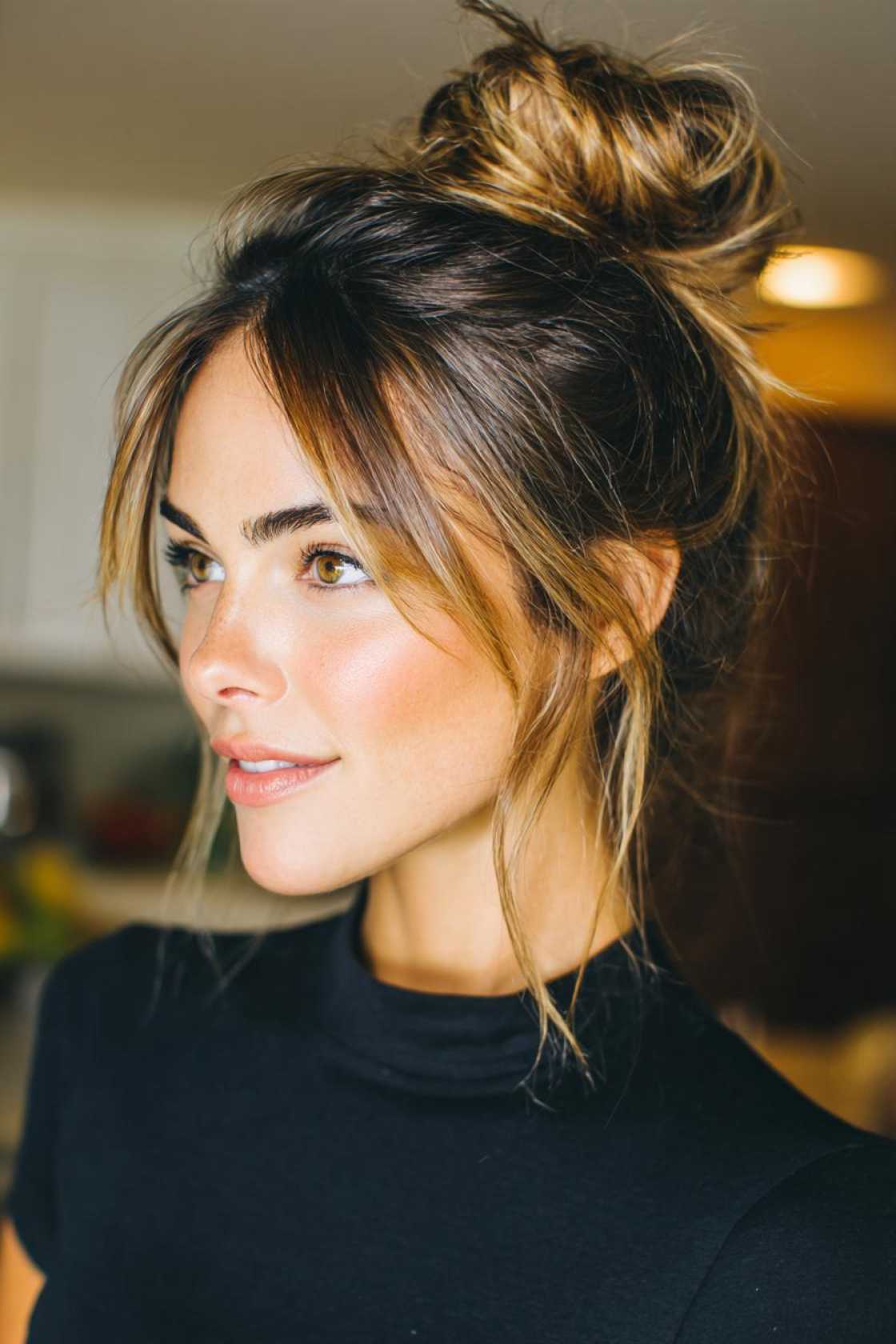 19+ Cute Ways to Wear Your Hair Up (Top Knots & Face-Framing Looks!) - 1. Top Knot with Face-Framing Layers