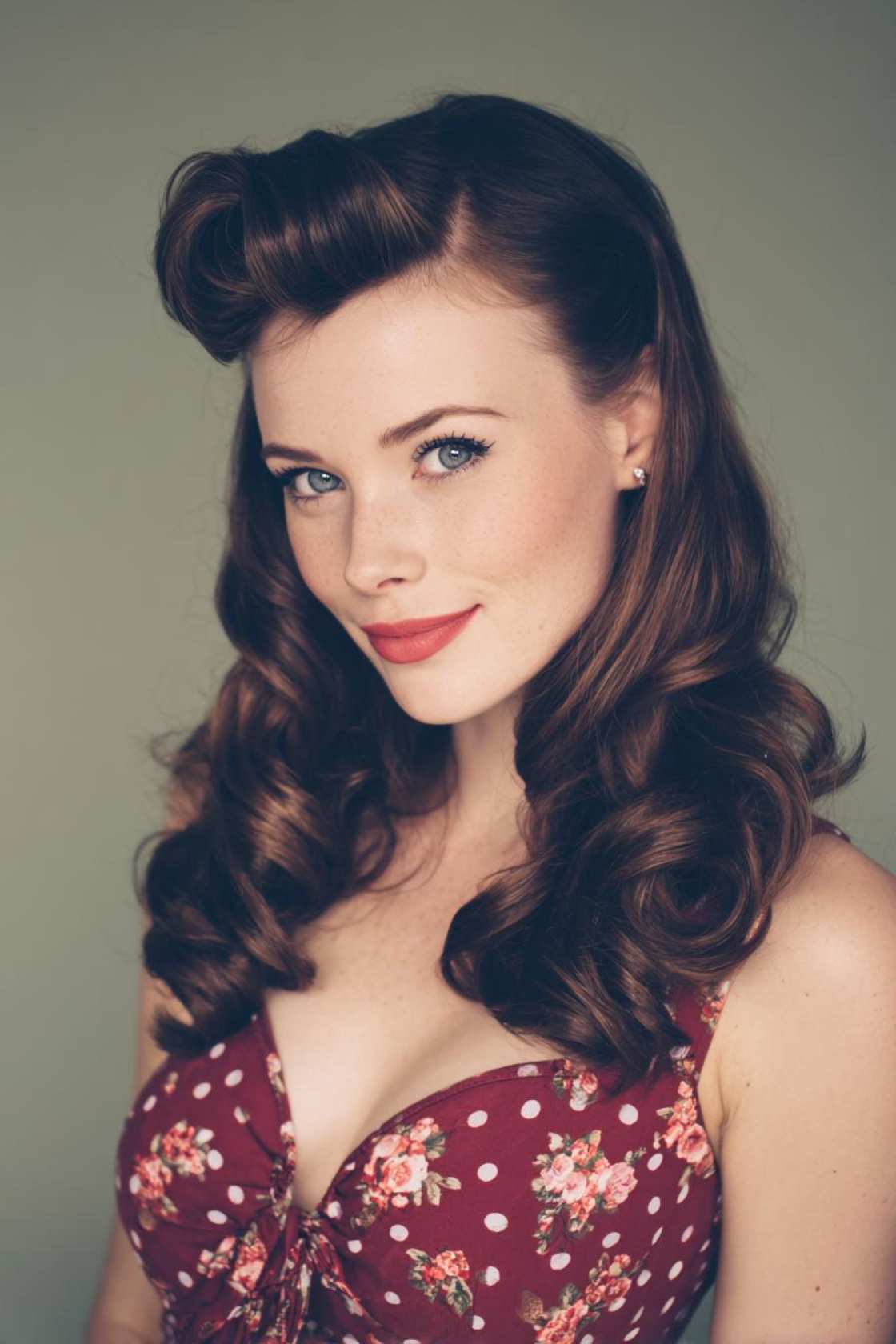 19+ Cute Ways to Wear Your Hair Up (Top Knots & Face-Framing Looks!) - 11. Pin-Up Style Roll