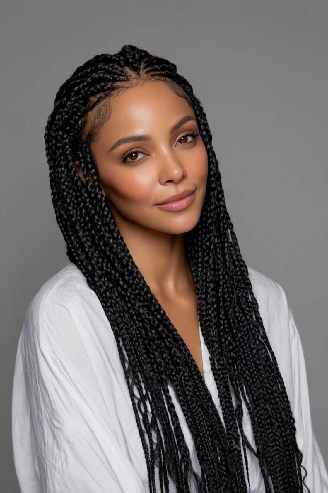 20+ Trending Knotless & Box Braid Ideas (Summer Styles!) - 10. Knotless Braids with a Middle Part
