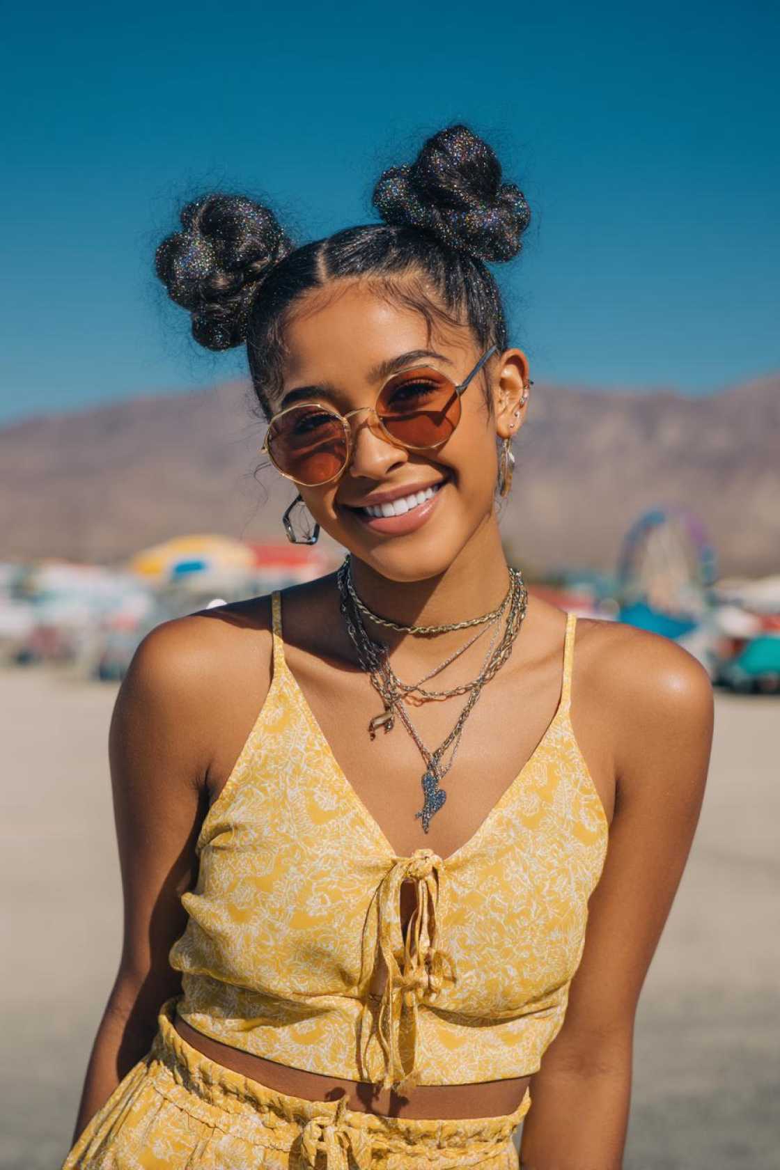 21+ Cute & Waterproof Hair Ideas for the Beach (Buns & Wraps) - 16. The Space Buns