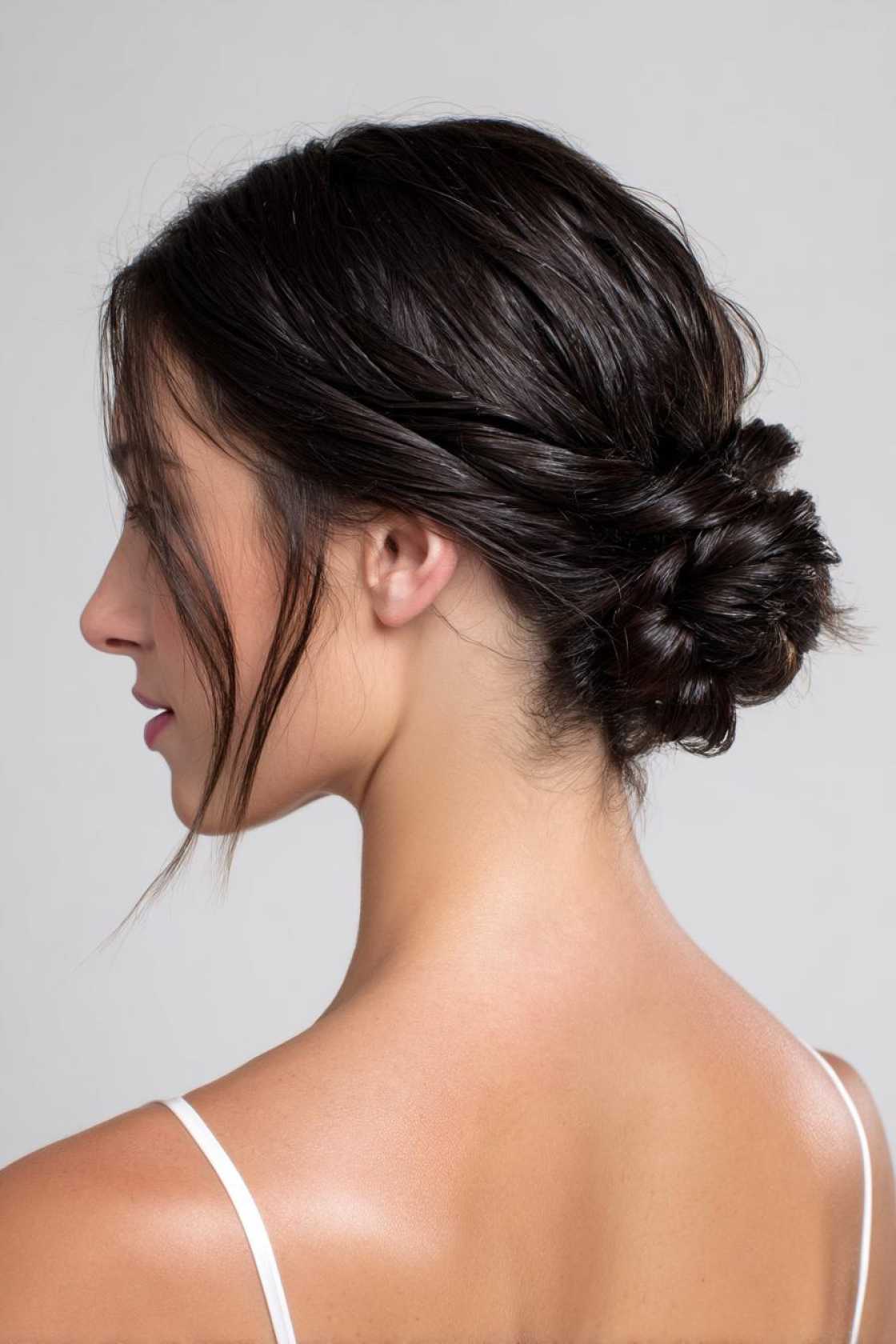 21+ Cute & Waterproof Hair Ideas for the Beach (Buns & Wraps) - 13. The Twisted Bun
