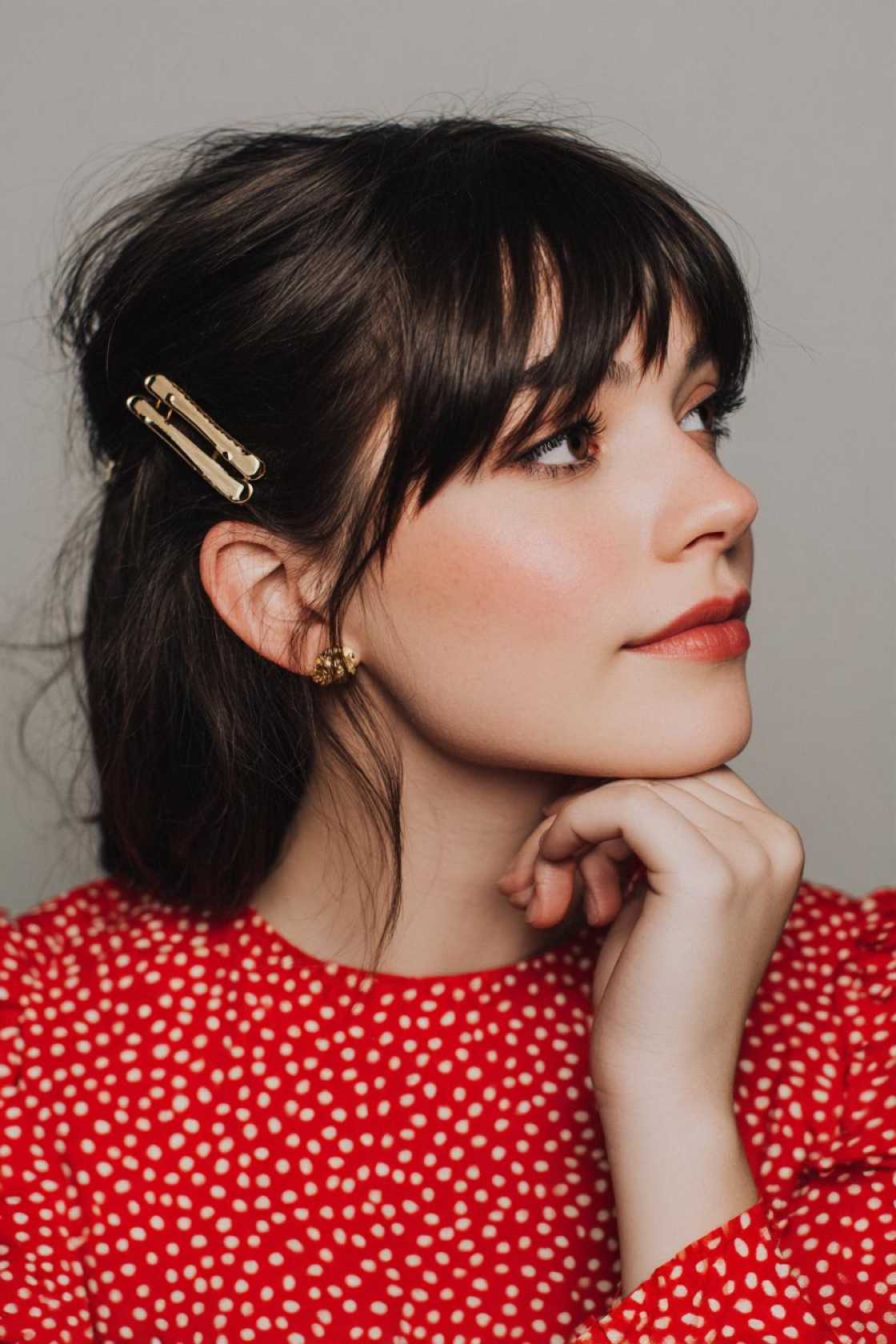 23+ Effortless Messy Claw Clip Hairstyles (Quick Twists & Buns!) - 13. Pulled-Back Bangs