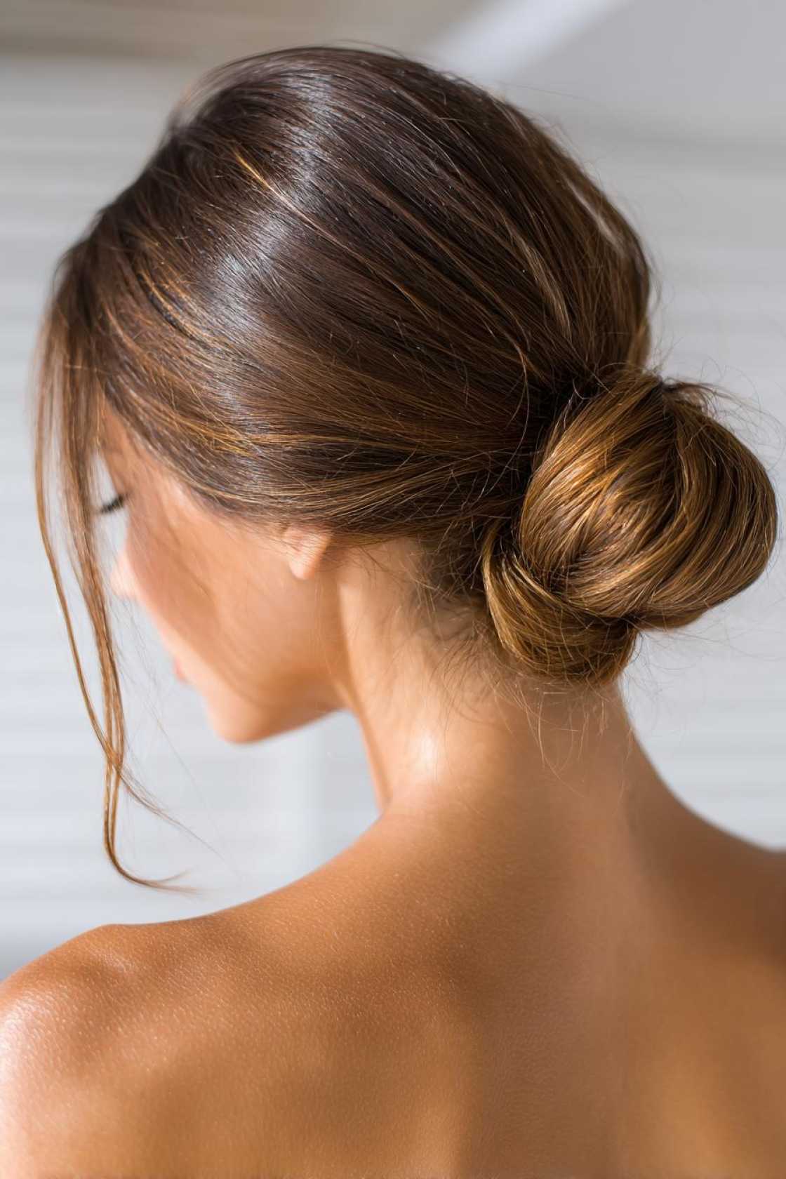 15+ Splash-Proof Pool Day Hairstyles: Cute, Secure & Chlorine-Ready! - 16. The Classic Low Bun