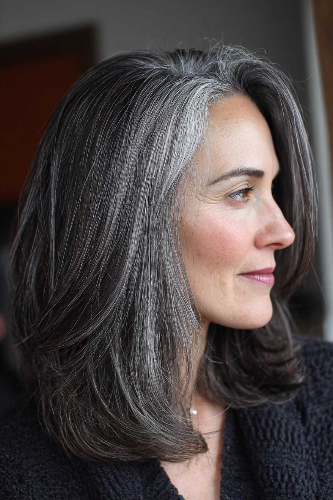 15+ Stunning Gray Blending Ideas for Dark Hair (Embrace Your Grays Gracefully!). - 16. Subtle Silver Streaks