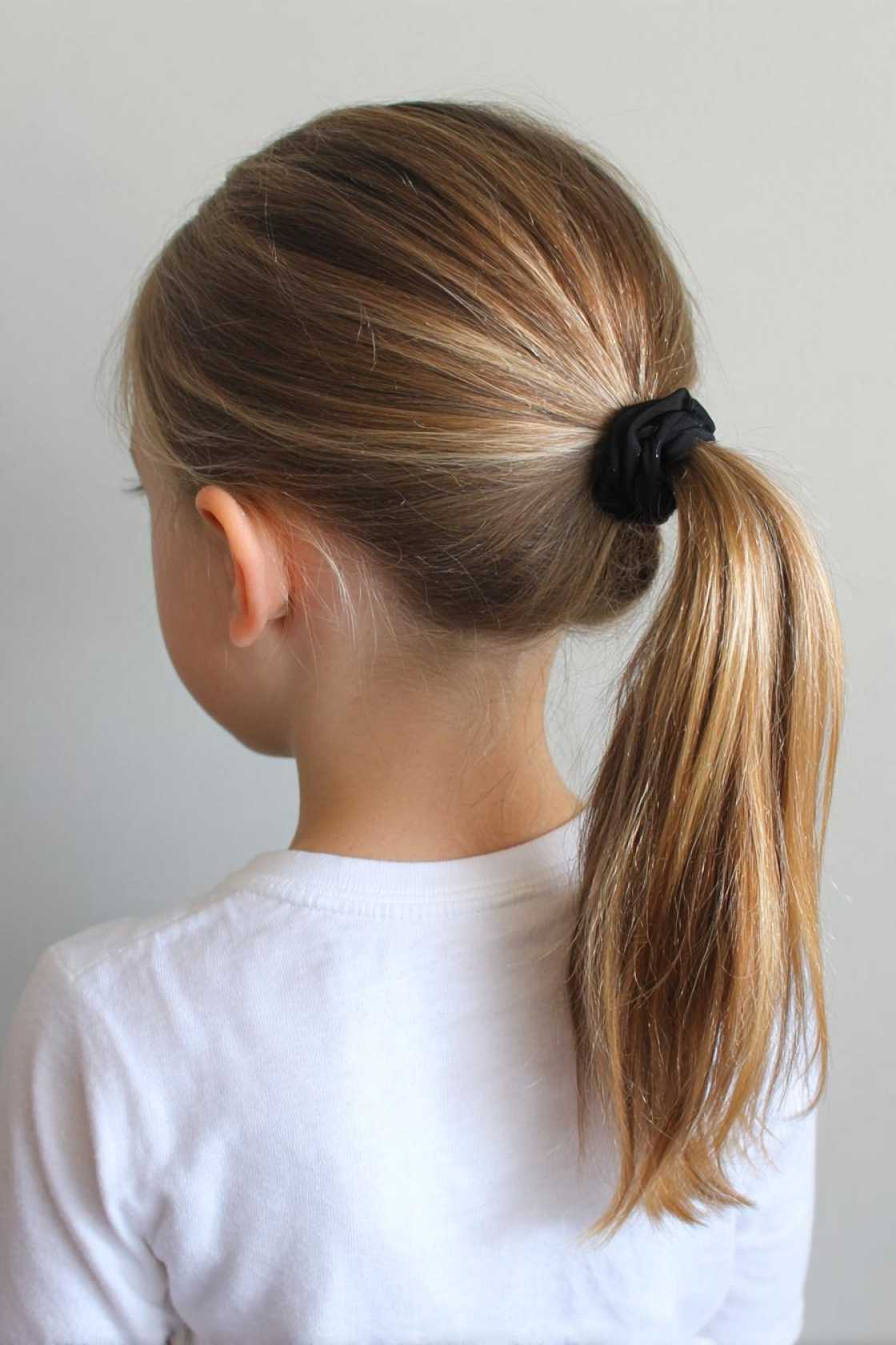 Accessorize for Success: 10+ Cute Back to School Hairstyles with Bows, Clips & Bands. - 10. Simple Band Ponytail