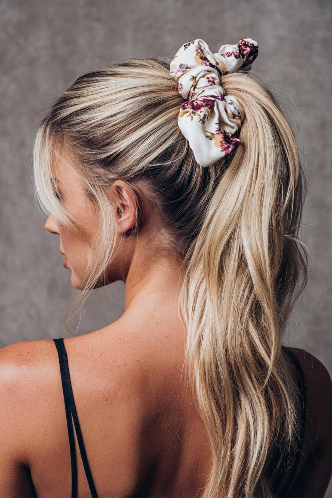 Accessorize for Success: 10+ Cute Back to School Hairstyles with Bows, Clips & Bands. - 2. Low Bun with a Large Bow