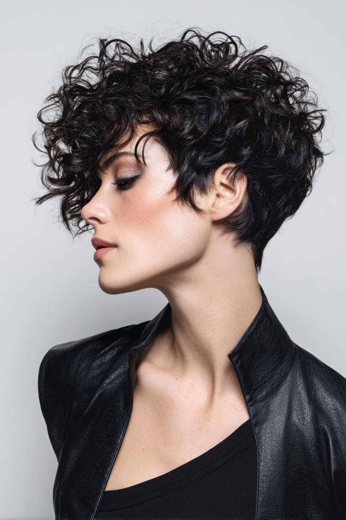 Beyond the Perm: 12+ Naturally Gorgeous Curly Hairstyles for the Mature Woman. - 11. The Asymmetrical Crop