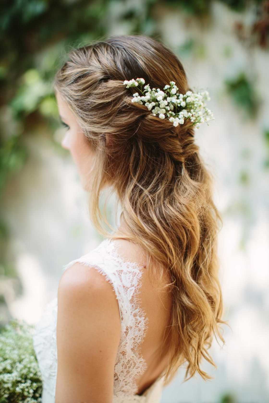 Eternal Summer Romance: 12+ Dreamy Wedding Hairstyles to Complement Your Warm-Weather Vows. - 12. Romantic Half-Up with Braids