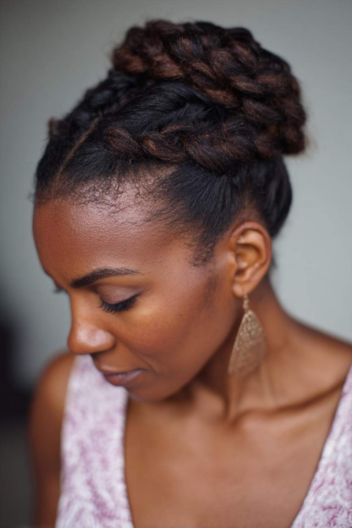 From Curls to Silk: 20+ Inspiring Silk Press Hairstyle Transformations. - 2. Updo with Braids