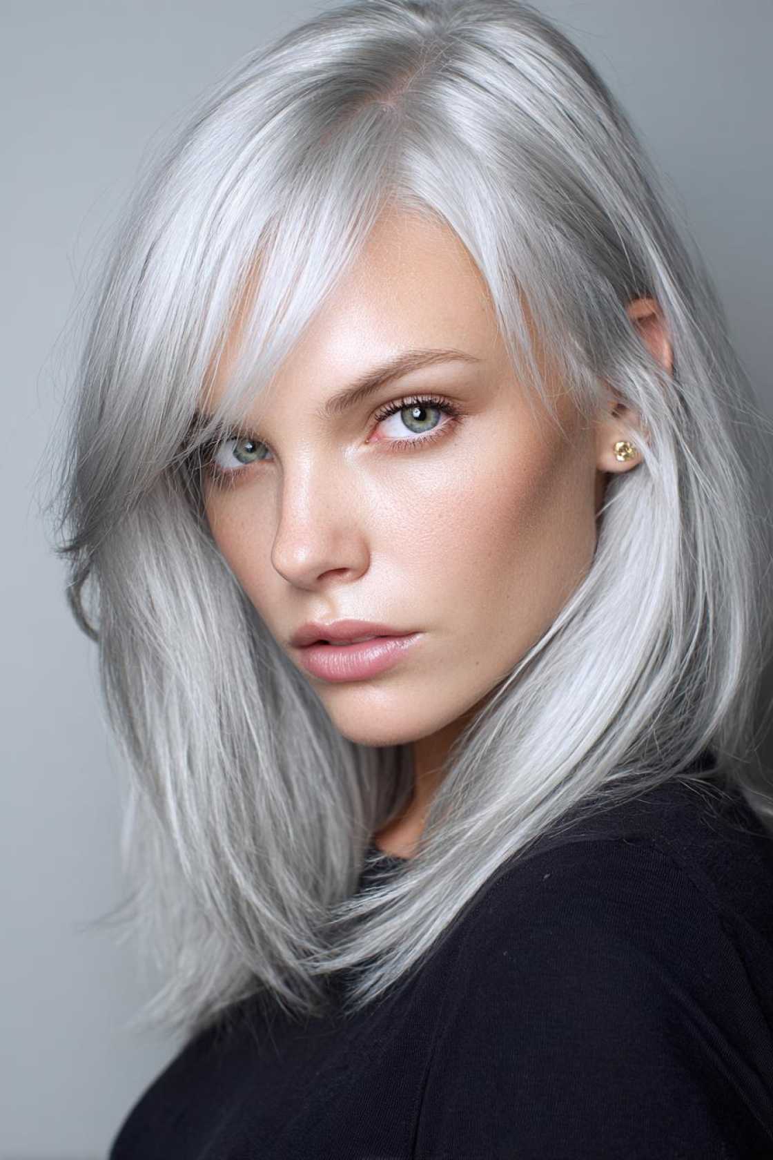 Low-Maintenance Magic: 20+ Gray Blending Looks for Dark Hair That Grow Out Beautifully. - 14. Icy Gray Face Frame
