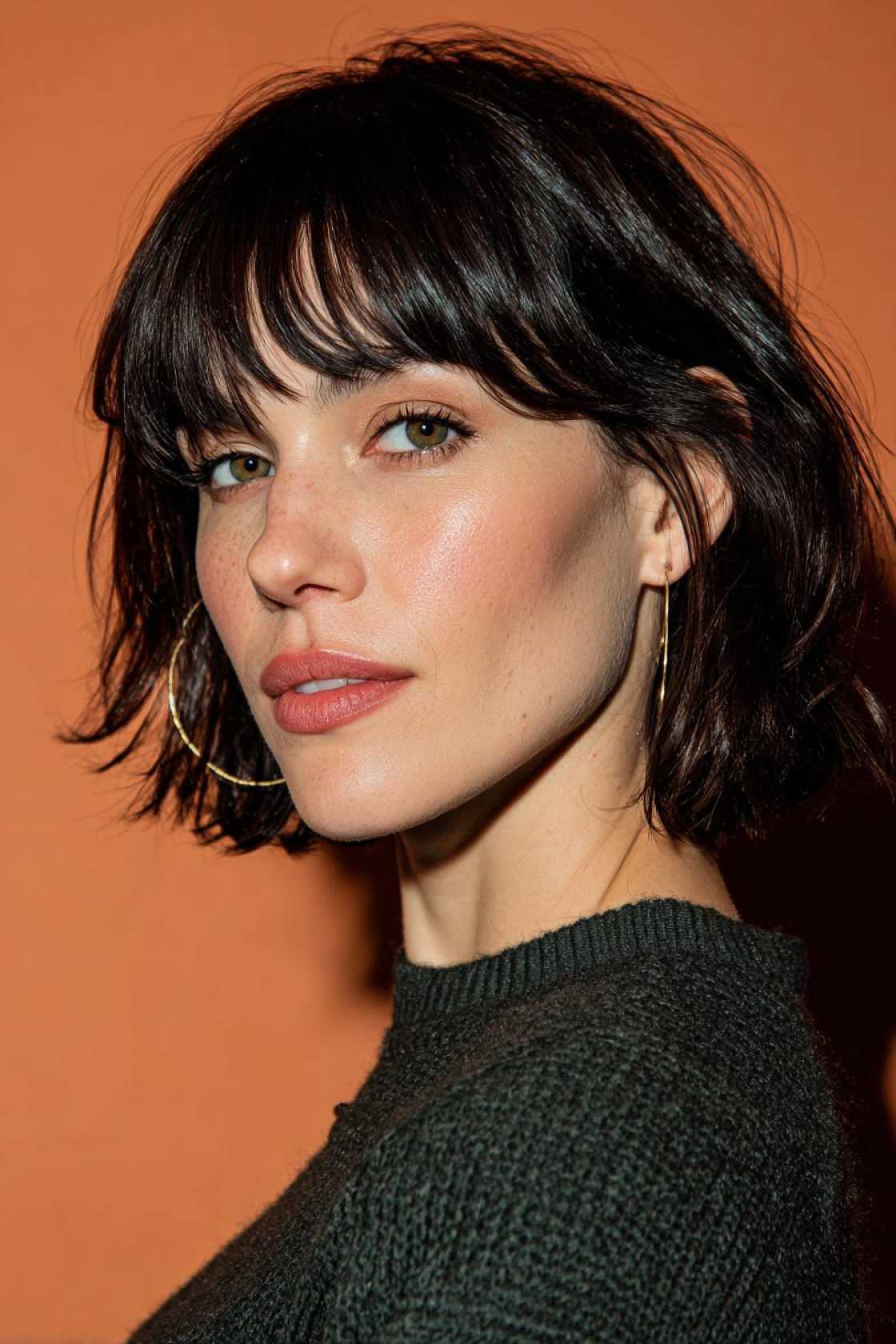 Unlock Volume & Movement: 20+ Stunning Layered Bob Haircut Ideas. - 18. Layered Bob with Bangs